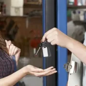 Les' Auto Repair - Mechanic handing keys to customer
